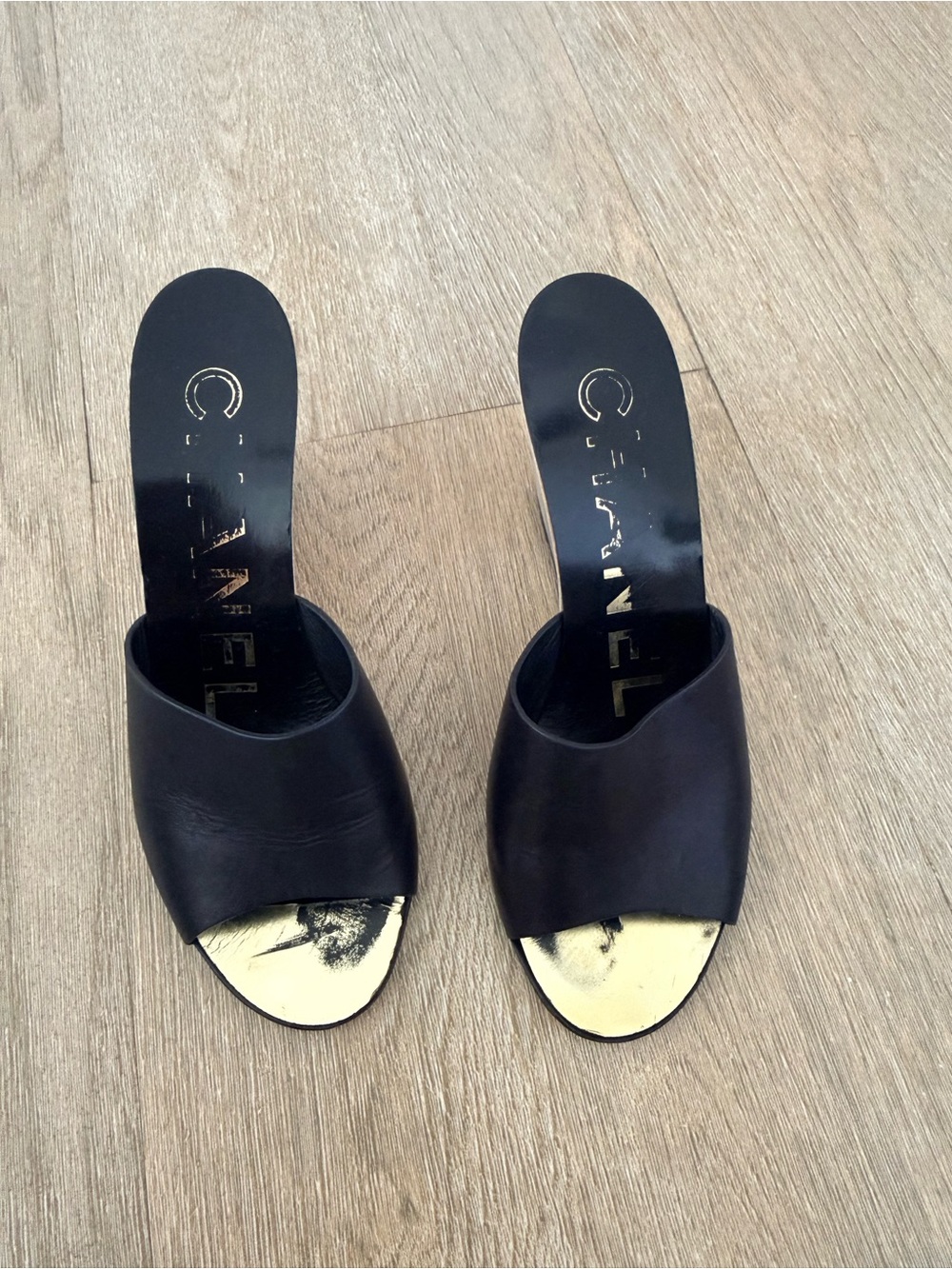 CHANEL Black Leather Open-Toe Slide Mules with Gold Toe Plate